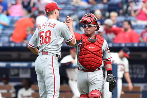 Jul 5, 2015; Atlanta, GA, USA; Philadelphia Phillies relief pitcher Jonathan Papelbon (58) and catcher Carlos Ruiz (51) react after defeating the Atlanta Braves at Turner Field. The Phillies defeated the Braves 4-0 in ten innings. Mandatory Credit: Dale Zanine-USA TODAY Sports