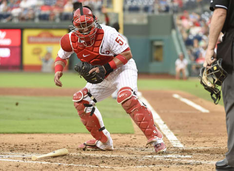 Jul 30, 2015; Philadelphia, PA, USA; Philadelphia Phillies catcher Carlos Ruiz (51) steps on home plate to get force out during the third inning against the Atlanta Braves at Citizens Bank Park. Mandatory Credit: Eric Hartline-USA TODAY Sports