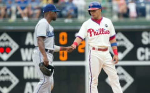 Aug 6, 2015; Philadelphia, PA, USA; Philadelphia Phillies second baseman Cesar Hernandez (16) reaches second base and greets Los Angeles Dodgers shortstop Jimmy Rollins (11) during the ninth inning at Citizens Bank Park. The Dodgers won 10-8. Mandatory Credit: Bill Streicher-USA TODAY Sports