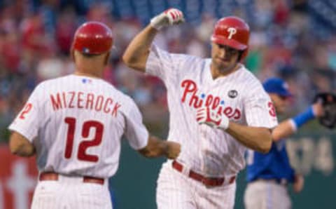 Aug 18, 2015; Philadelphia, PA, USA; Philadelphia Phillies right fielder Jeff Francoeur (3) is congratulated by third base coach John Mizerock (12) after hitting a home run during the second inning against the Toronto Blue Jays at Citizens Bank Park. Mandatory Credit: Bill Streicher-USA TODAY Sports