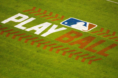 May 13, 2016; Philadelphia, PA, USA; An MLB play ball logo painted on the grass at Citizens Bank Park during a game between the Philadelphia Phillies and the Cincinnati Reds. The Philadelphia Phillies won 3-2. Mandatory Credit: Bill Streicher-USA TODAY Sports