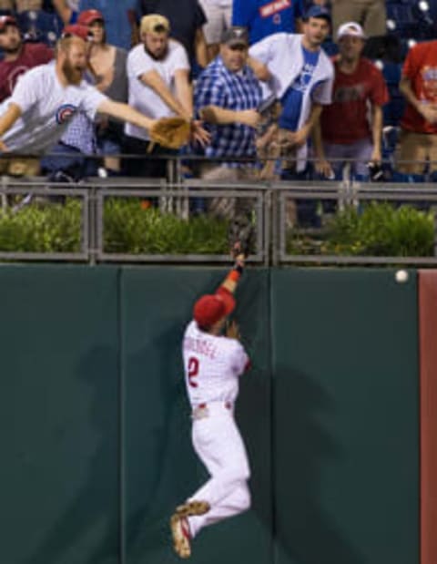 Jun 6, 2016; Philadelphia, PA, USA; Philadelphia Phillies left fielder Tyler Goeddel (2) can’t get to the double off Chicago Cubs third baseman Kris Bryant (not pictured) during the ninth inning at Citizens Bank Park. The Chicago Cubs won 6-4. Mandatory Credit: Bill Streicher-USA TODAY Sports