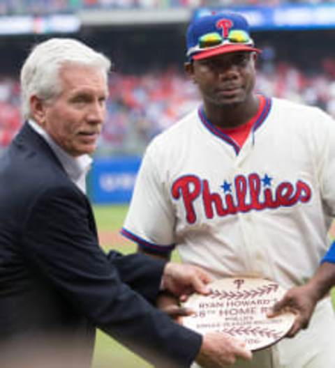 Oct 2, 2016; Philadelphia, PA, USA; Philadelphia Phillies first baseman Ryan Howard (6) is presented a Phillies great Mike Schmidt during a pregame ceremony before action against the New York Mets at Citizens Bank Park. Mandatory Credit: Bill Streicher-USA TODAY Sports