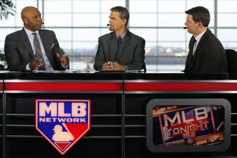 Dec 5, 2016; National Harbor, MD, USA; MLB Network personalities (L-R) Cliff Floyd and Mike Lowell speak with Los Angeles Dodgers pitcher Rich Hill (R) on set after Hill signed a three-year contract during the 2016 MLB Winter Meetings at Gaylord National Resort & Convention Center. Mandatory Credit: Geoff Burke-USA TODAY Sports