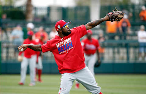 Mar 13, 2017; Sarasota, FL, USA; Philadelphia Phillies left fielder Howie Kendrick (47) throws the ball as he works out prior to the game against the Baltimore Orioles at Ed Smith Stadium. Mandatory Credit: Kim Klement-USA TODAY Sports