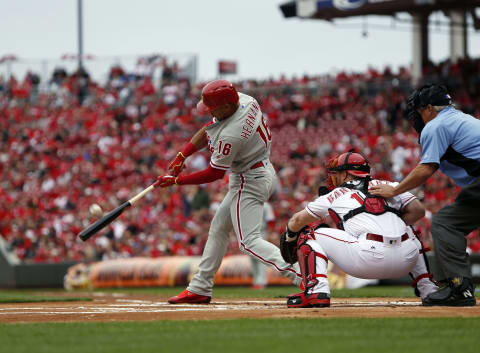 Apr 3, 2017; Cincinnati, OH, USA; Philadelphia Phillies second baseman Cesar Hernandez (16) hits a home run during the first inning against the Cincinnati Reds at Great American Ball Park. Mandatory Credit: Frank Victores-USA TODAY Sports