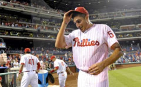 Jul 5, 2016; Philadelphia, PA, USA; Philadelphia Phillies starting pitcher Zach Eflin (56) reacts after getting Powerade dumped on him by right fielder Jimmy Paredes (41) and second baseman Andres Blanco (4)after beating the Atlanta Braves and picking up his first major league win at Citizens Bank Park. The Phillies defeated the Braves, 5-1. Mandatory Credit: Eric Hartline-USA TODAY Sports