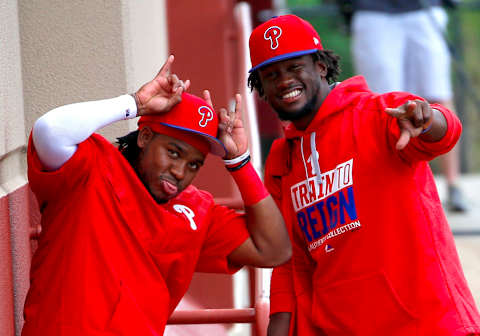 Feb 22, 2017; Clearwater, FL, USA; Philadelphia Phillies third baseman Maikel Franco (7) and center fielder Odubel Herrera (37) cut up for a photo during spring training at Spectrum Field. Mandatory Credit: Butch Dill-USA TODAY Sports