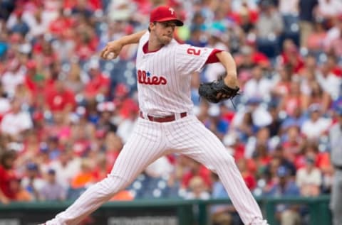 Jul 2, 2016; Philadelphia, PA, USA; Philadelphia Phillies starting pitcher Aaron Nola (27) pitches during the first inning against the Kansas City Royals at Citizens Bank Park. Mandatory Credit: Bill Streicher-USA TODAY Sports