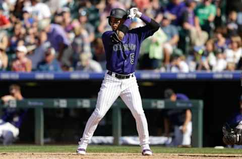 Sep 4, 2016; Denver, CO, USA; Colorado Rockies right fielder Carlos Gonzalez (5) readies to bat in the fifth inning against the Arizona Diamondbacks at Coors Field. Mandatory Credit: Isaiah J. Downing-USA TODAY Sports