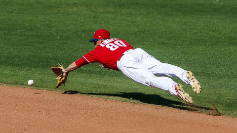 Mar 3, 2017; Clearwater, FL, USA; Philadelphia Phillies second baseman Scott Kingery (80) makes a diving grab on a ground ball in the sixth inning of a baseball game against the Minnesota Twins during spring training at Spectrum Field. Mandatory Credit: Butch Dill-USA TODAY Sports