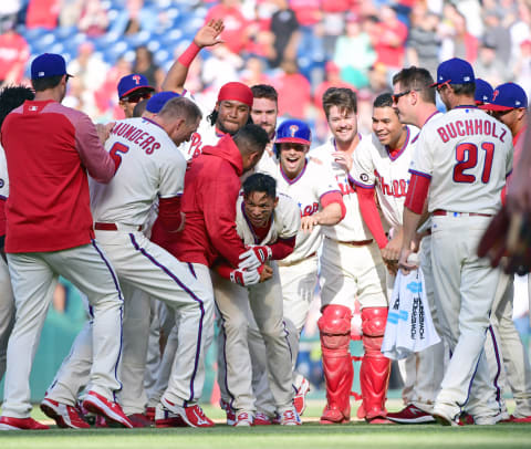 Apr 9, 2017; Philadelphia, PA, USA; Philadelphia Phillies second baseman Cesar Hernandez (16) celebrates with teammates after hitting walk-off RBI single in bottom of ninth inning against the Washington Nationals at Citizens Bank Park. The Phillies defeated the Nationals, 4-3. Mandatory Credit: Eric Hartline-USA TODAY Sports