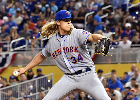 Apr 14, 2017; Miami, FL, USA; New York Mets starting pitcher Noah Syndergaard (34) delivers a pitch during the first inning against the Miami Marlins at Marlins Park. Mandatory Credit: Steve Mitchell-USA TODAY Sports