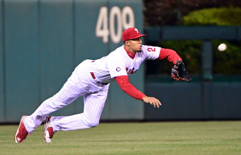 Apr 22, 2017; Philadelphia, PA, USA; Philadelphia Phillies right fielder Aaron Altherr (23) makes a catch during the eighth inning against the Atlanta Braves at Citizens Bank Park. The Phillies defeated the Braves, 4-3 in 10 innings. Mandatory Credit: Eric Hartline-USA TODAY Sports