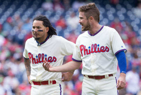 Apr 23, 2017; Philadelphia, PA, USA; Philadelphia Phillies shortstop Freddy Galvis (left) and first baseman Brock Stassi (right) talk between innings against the Atlanta Braves at Citizens Bank Park. The Phillies won 5-2. Mandatory Credit: Bill Streicher-USA TODAY Sports