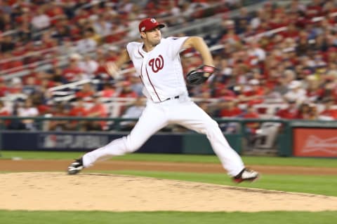 Oct 7, 2016; Washington, DC, USA;(EDITORS NOTE: Time exposure photo) Washington Nationals starting pitcher Max Scherzer (31) pitches against the Los Angeles Dodgers in the fourth inning during game one of the 2016 NLDS playoff baseball series at Nationals Park. Mandatory Credit: Geoff Burke-USA TODAY Sports