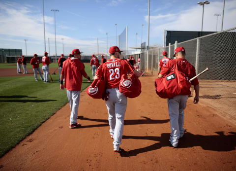 Feb 22, 2017; Goodyear, AZ, USA; Cincinnati Reds left fielder Adam Duvall (23) carries his bag along with Billy Hamilton’s over to the workout area at the Cincinnati Reds Player Development Complex. Mandatory credit: Sam Green/Cincinnati Enquirer via USA TODAY NETWORK