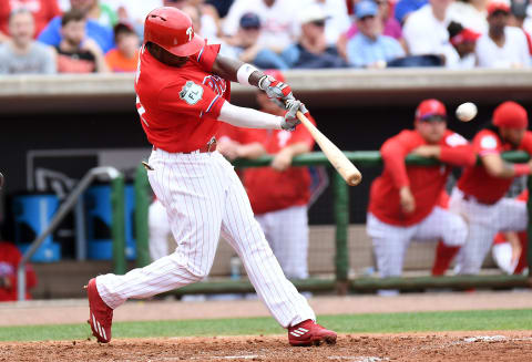 Mar 12, 2017; Clearwater, FL, USA; Philadelphia Phillies outfielder Roman Quinn (24) hits a solo home run in the third inning of the spring training game against the Boston Red Sox at Spectrum Field. Mandatory Credit: Jonathan Dyer-USA TODAY Sports