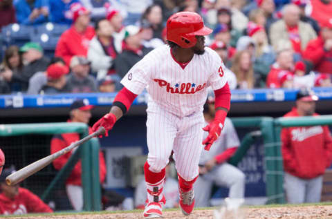 Apr 7, 2017; Philadelphia, PA, USA; Philadelphia Phillies center fielder Odubel Herrera (37) hits a single during the fourth inning against the Washington Nationals at Citizens Bank Park. Mandatory Credit: Bill Streicher-USA TODAY Sports