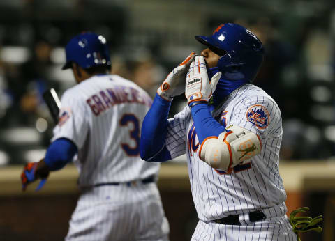 Apr 7, 2017; New York City, NY, USA; New York Mets left fielder Yoenis Cespedes (52) reacts after hitting a home run against the Miami Marlins in the eight inning at Citi Field. Mandatory Credit: Noah K. Murray-USA TODAY Sports