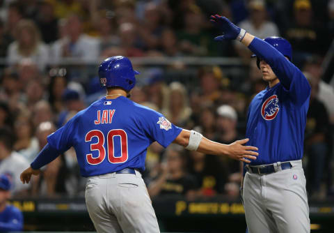 Apr 26, 2017; Pittsburgh, PA, USA; Chicago Cubs center fielder Jon Jay (30) celebrates after scoring a run with first baseman Anthony Rizzo (right) against the Pittsburgh Pirates during the fourth inning at PNC Park. Mandatory Credit: Charles LeClaire-USA TODAY Sports