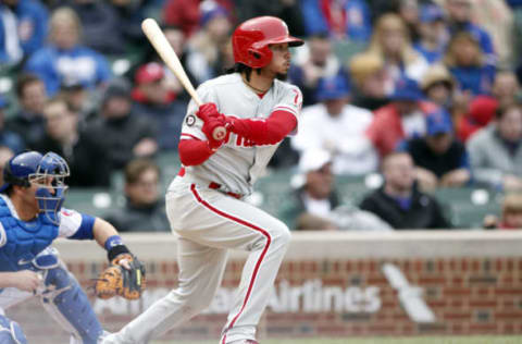 May 4, 2017; Chicago, IL, USA; Philadelphia Phillies shortstop Freddy Galvis (13) hits a single during the fourth inning against the Chicago Cubs at Wrigley Field. Mandatory Credit: Caylor Arnold-USA TODAY Sports