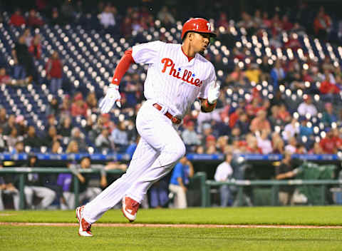 May 22, 2017; Philadelphia, PA, USA; Philadelphia Phillies left fielder Aaron Altherr (23) hits a double during the fourth inning against the Colorado Rockies at Citizens Bank Park. Mandatory Credit: Eric Hartline-USA TODAY Sports