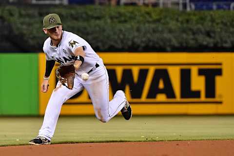 May 29, 2017; Miami, FL, USA; Miami Marlins shortstop JT Riddle (39) fields a ground ball before throwing to first base for an out against the Philadelphia Phillies in the second inning at Marlins Park. Mandatory Credit: Jasen Vinlove-USA TODAY Sports