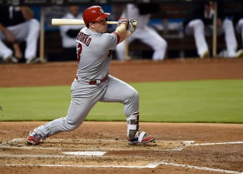 May 10, 2017; Miami, FL, USA; St. Louis Cardinals third baseman Jedd Gyorko (3) connects for a two run RBI single during the third inning against the Miami Marlins at Marlins Park. Mandatory Credit: Steve Mitchell-USA TODAY Sports