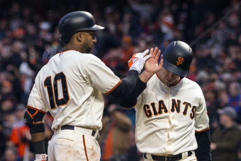 May 30, 2017; San Francisco, CA, USA; San Francisco Giants left fielder Aaron Hill (7) celebrates with third baseman Eduardo Nunez (10) after scoring a run against the Washington Nationals in the second inning at AT&T Park. Mandatory Credit: John Hefti-USA TODAY Sports