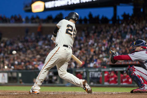 May 30, 2017; San Francisco, CA, USA; San Francisco Giants catcher Buster Posey (28) hits a single against the Washington Nationals in the third inning at AT&T Park. Mandatory Credit: John Hefti-USA TODAY Sports