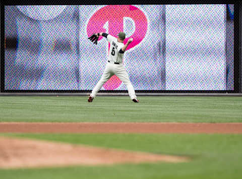 May 27, 2017; Philadelphia, PA, USA; Philadelphia Phillies right fielder Michael Saunders (5) warms up in the outfield during a game against the Cincinnati Reds at Citizens Bank Park. Mandatory Credit: Bill Streicher-USA TODAY Sports