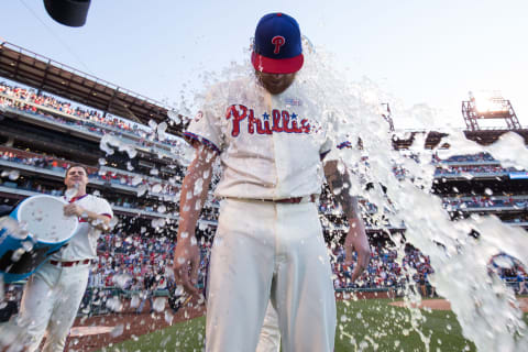 Jun 3, 2017; Philadelphia, PA, USA; Philadelphia Phillies starting pitcher Ben Lively (49) is doused with ice by first baseman Tommy Joseph (19) after a victory against the San Francisco Giants in his first MLB start at Citizens Bank Park. Mandatory Credit: Bill Streicher-USA TODAY Sports