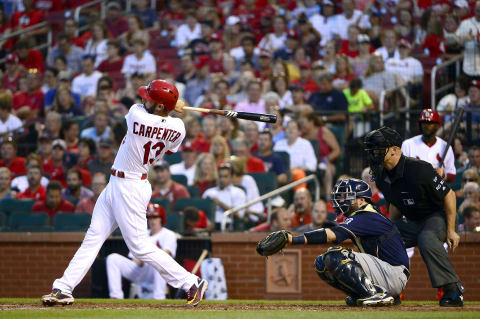 Jun 14, 2017; St. Louis, MO, USA; St. Louis Cardinals first baseman Matt Carpenter (13) hits a one run double off of Milwaukee Brewers starting pitcher Matt Garza (not pictured) during the second inning at Busch Stadium. Mandatory Credit: Jeff Curry-USA TODAY Sports