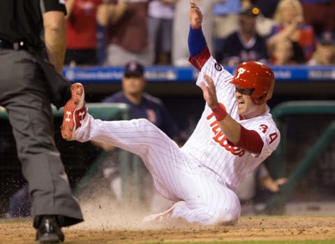 Jun 15, 2017; Philadelphia, PA, USA; Philadelphia Phillies catcher Andrew Knapp (34) scores a run against the Boston Red Sox during the eighth inning at Citizens Bank Park. Mandatory Credit: Bill Streicher-USA TODAY Sports