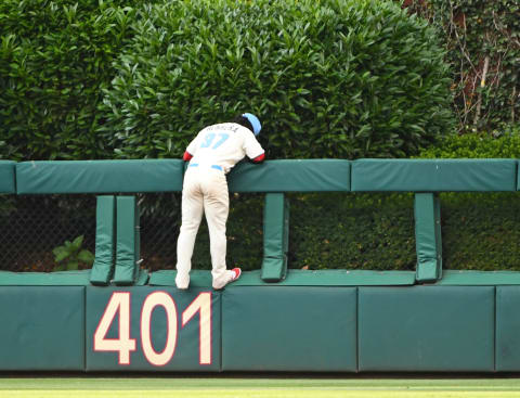 Jun 18, 2017; Philadelphia, PA, USA; Philadelphia Phillies center fielder Odubel Herrera (37) leans on the outfield wall after watching a solo home run by Arizona Diamondbacks center fielder Reymond Fuentes (not pictured) during the tenth inning at Citizens Bank Park. The Diamondbacks defeated the Phillies 5-4 in 10 innings. Mandatory Credit: Eric Hartline-USA TODAY Sports