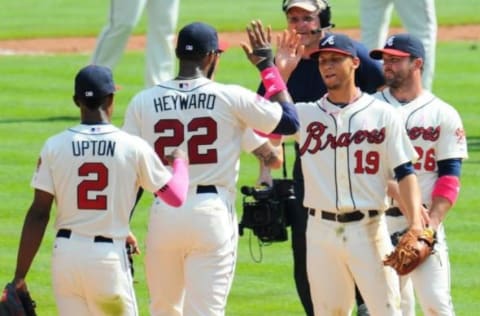 May 11, 2014; Atlanta, GA, USA; Atlanta Braves right fielder Jason Heyward (22) and shortstop 