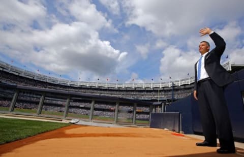 Aug 23, 2015; Bronx, NY, USA; New York Yankees retired pitcher Andy Pettitte waves to the crowd from the bullpen mound before a ceremony retiring his number at Yankee Stadium