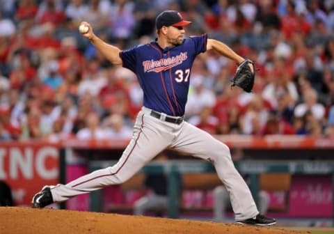 July 22, 2015; Anaheim, CA, USA; Minnesota Twins starting pitcher Mike Pelfrey (37) pitches the third inning against the Los Angeles Angels at Angel Stadium of Anaheim. Mandatory Credit: Gary A. Vasquez-USA TODAY Sports