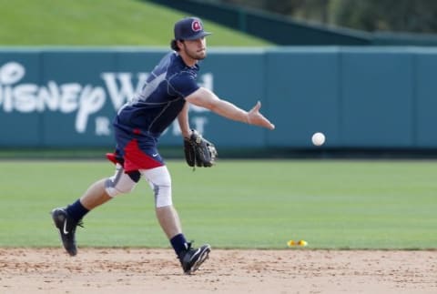 Feb 22, 2016; Lake Buena Vista, FL, USA; Atlanta Braves infielder Dansby Swanson tosses to second base during spring training workouts at ESPN