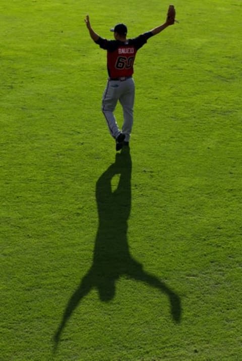 Sep 8, 2015; Philadelphia, PA, USA; Atlanta Braves pitcher Manny Banuelos (60) stretches before a game against the Philadelphia Phillies at Citizens Bank Park. Mandatory Credit: Bill Streicher-USA TODAY Sports