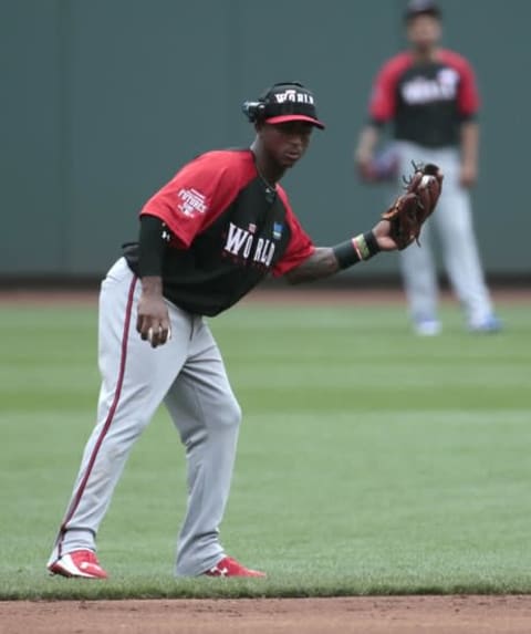 Jul 12, 2015; Cincinnati, OH, USA; World infielder Ozhaino Albies fields a ball during batting practice before the All Star Futures Game with the U.S. Team at Great American Ballpark. Mandatory Credit: David Kohl-USA TODAY Sports