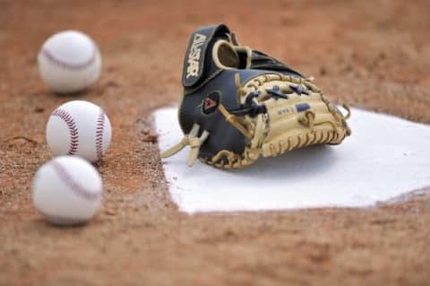 Mar 12, 2014; Jupiter, FL, USA; A detail shot of Miami Marlins bench coach Rob Leary catchers glove prior to a game against the Atlanta Braves at Roger Dean Stadium. Mandatory Credit: Steve Mitchell-USA TODAY Sports