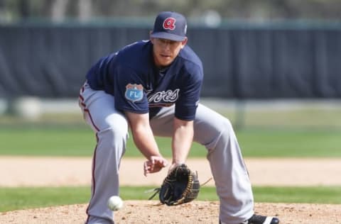 Feb 29, 2016; Lake Buena Vista, FL, USA; Atlanta Braves pitcher Aaron  Blair fields a ball during spring training workouts at ESPN