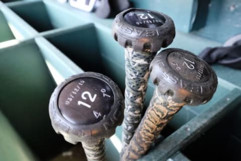 Apr 17, 2015; Detroit, MI, USA; Bats of Chicago White Sox third baseman Conor Gillaspie (12) in the dugout before the game against the Detroit Tigers at Comerica Park. Mandatory Credit: Rick Osentoski-USA TODAY Sports