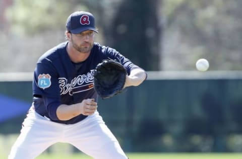 Feb 22, 2016; Lake Buena Vista, FL, USA; Atlanta Braves relief pitcher Jason Grilli (39) fields the ball during spring training workouts at ESPN