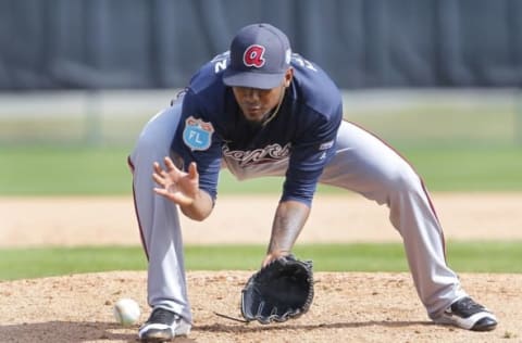 Feb 29, 2016; Lake Buena Vista, FL, USA; Atlanta Braves starting pitcher Julio Teheran fields a ball during spring training workouts at ESPN