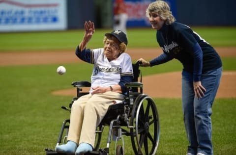 May 31, 2015; Milwaukee, WI, USA; 102-year-old Gladys Holbrook (L) throws the ceremonial first pitch prior to the game between the Milwaukee Brewers and Arizona Diamondbacks at Miller Park. Mandatory Credit: Benny Sieu-USA TODAY Sports