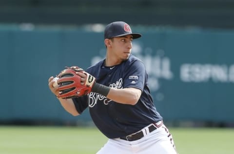 Mar 3, 2016; Lake Buena Vista, FL, USA; Atlanta Braves shortstop Daniel Castro (14) makes a throw to first during the sixth inning of a spring training baseball game against the Detroit Tigers at Champion Stadium. Mandatory Credit: Reinhold Matay-USA TODAY Sports