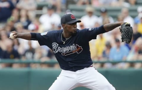 Mar 30, 2016; Lake Buena Vista, FL, USA; Atlanta Braves starting pitcher Julio Teheran (49) pitches during the first inning of a spring training baseball game against the New York Yankees at Champion Stadium. Mandatory Credit: Reinhold Matay-USA TODAY Sports